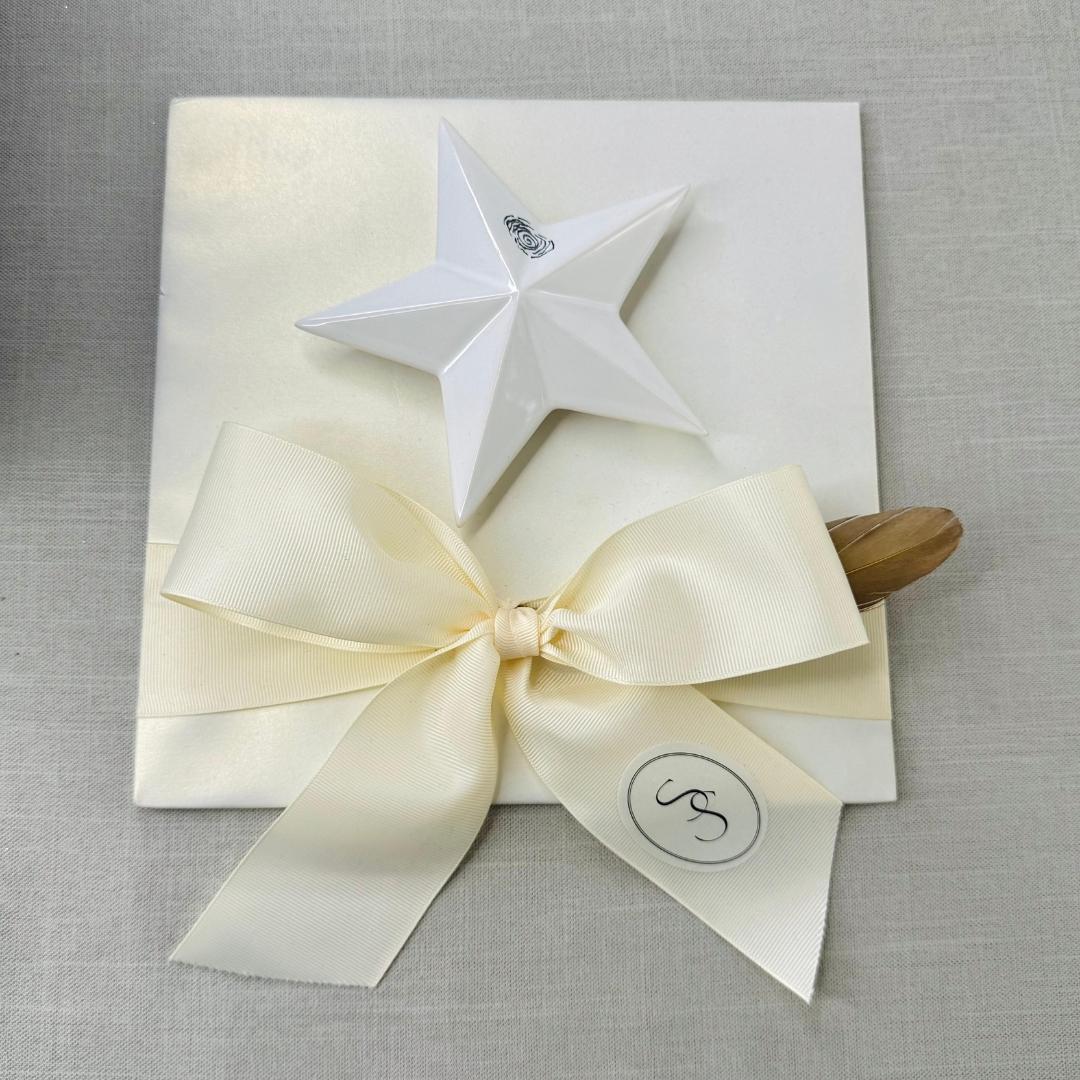 presentación estrella abrazos del cielo colección ssiento